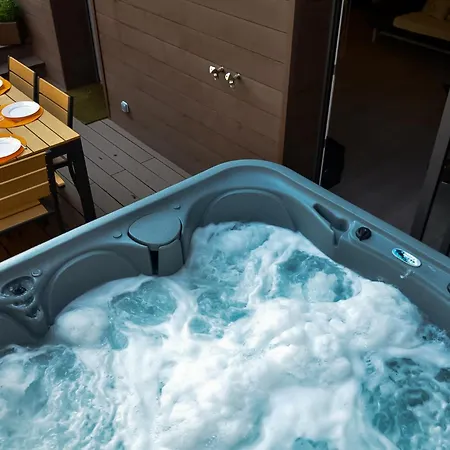 Holiday home Jacuzzi 38C Sauna Prive - Climatisation